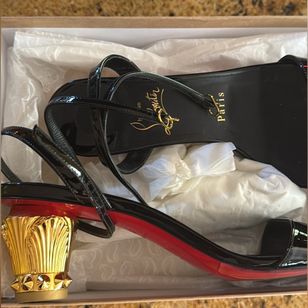 Christian Louboutin Black Heels with Red Sole and Gold Accent